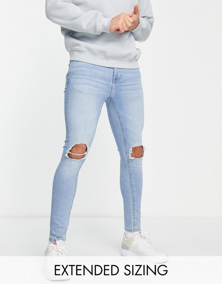 Asos Design Spray-on Jeans In Power Stretch In Light Wash With Knee Rips-blue