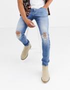 Asos Design 12.5oz 'cigarette' Skinny Jeans In Mid Wash Blue With Busted Knees