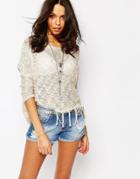 Stitch & Pieces Loose Sweater With Tassel Hem - Cream