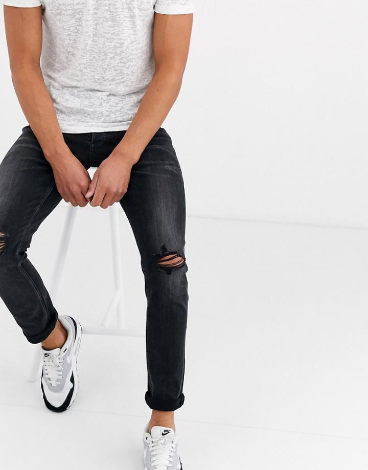 Jack & Jones Intelligence Slim Fit Tapered Jeans With Plastic Sheet Pocket In Black Wash
