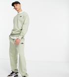The North Face Oversized Essential Sweatpants In Green Exclusive At Asos