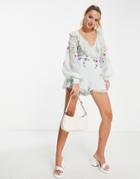 Asos Design Embroidered Textured Cut-out Romper With Ruffle Wrap In Pale Blue