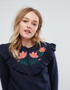 Monki Floral Embroidered Frill Front Sweatshirt - Blue