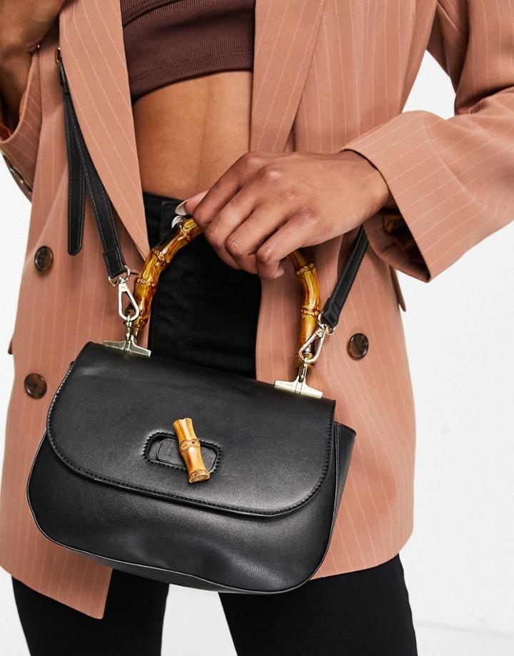 Truffle Collection Crossbody Bag With Bamboo Style Handle In Black