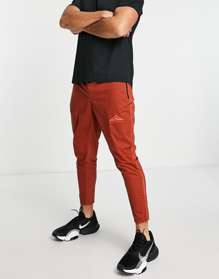 Nike Running Phenom Elite Dri-fit Trail Sweatpants In Dark Orange
