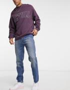 Asos Design High Rise Regular Jeans In Mid Wash Blue-blues