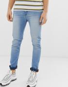 Asos Design Super Spray On Jeans In Light Blue