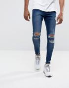 Illusive London Super Skinny Jeans In Mid Wash Blue With Distressing - Blue