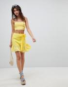 Asos Design Cotton Broderie Mini Skirt With Pep Hem And Tie Waist - Yellow