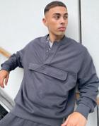 Asos Design Oversized Sweatshirt With Rib Collar In Washed Black