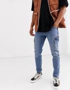 Asos Design Slim Jeans With Cargo Pockets In Dark Wash Blue