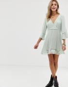 En Creme Skater Dress With Floral Lace Inserts - Green