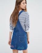 Liquor & Poker Pinafore Dress With Back Slogan - Blue