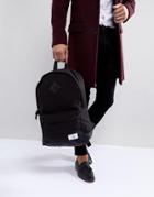 Asos Design Backpack In Black Canvas With Faux Leather Base
