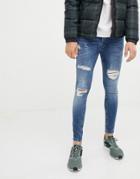 Gym King Muscle Jeans In Mid Wash Blue With Distressing - Blue