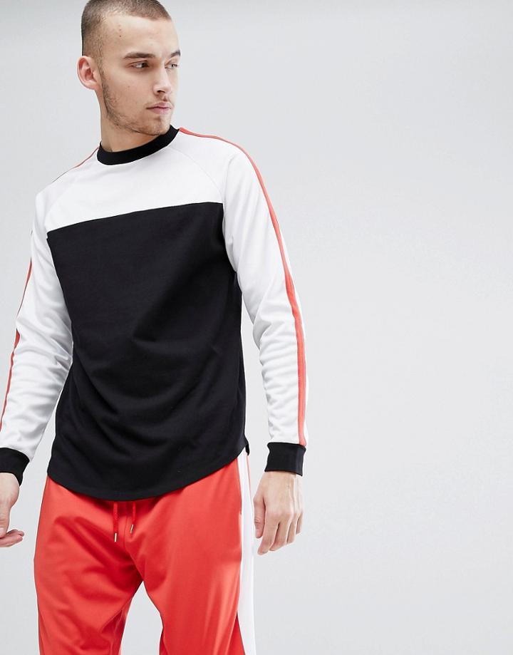 Asos Relaxed Super Longline Long Sleeve T-shirt With Contrast Yoke And Curved Hem - Black
