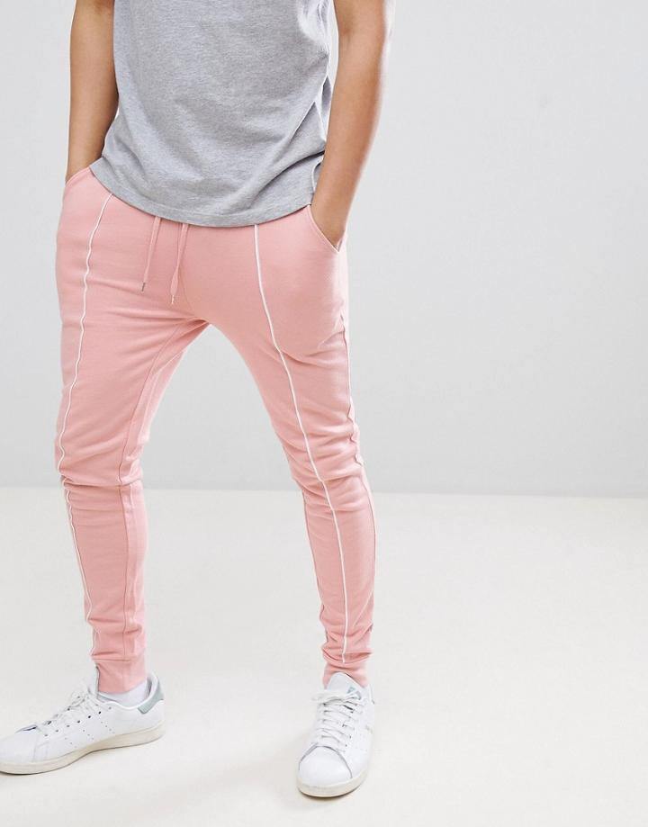 Asos Design Super Skinny Joggers In Pink With White Piping - Pink