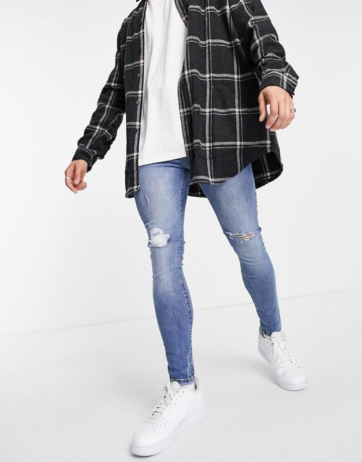 The Couture Club Distressed Super Skinny Jean In Mid Blue Vintage Wash-blues