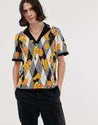 Asos Design Knitted Revere Collar Polo In Fruit Design-black