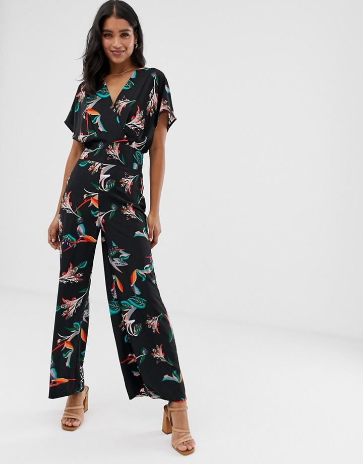 Liquorish Wrap Front Jumpsuit In Tropical Floral Print - Black
