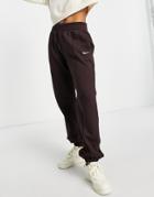 Nike Collection Fleece Loose-fit Cuffed Sweatpants In Dark Brown