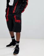 Asos X Star Wars Oversized Poly Tricot Shorts With Printed Tape - Black