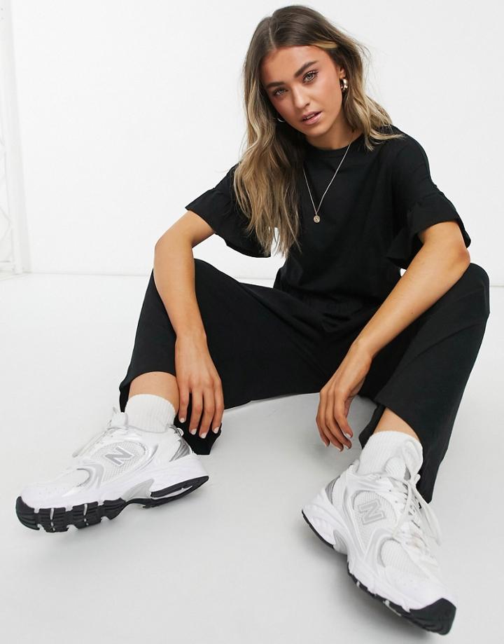 Asos Design Jersey Smock Jumpsuit With Frill Sleeve In Black