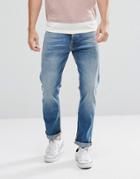 Nudie Jeans Co Fearless Freddie Loose Taper Fit Jean Shiny Indigo Wash - Blue