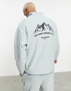 Asos Design Oversized Half Zip Sweatshirt In Green Polar Fleece With Mountain Print