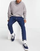 Asos Design Classic Rigid Pleated Jeans In Mid Wash Blue-blues