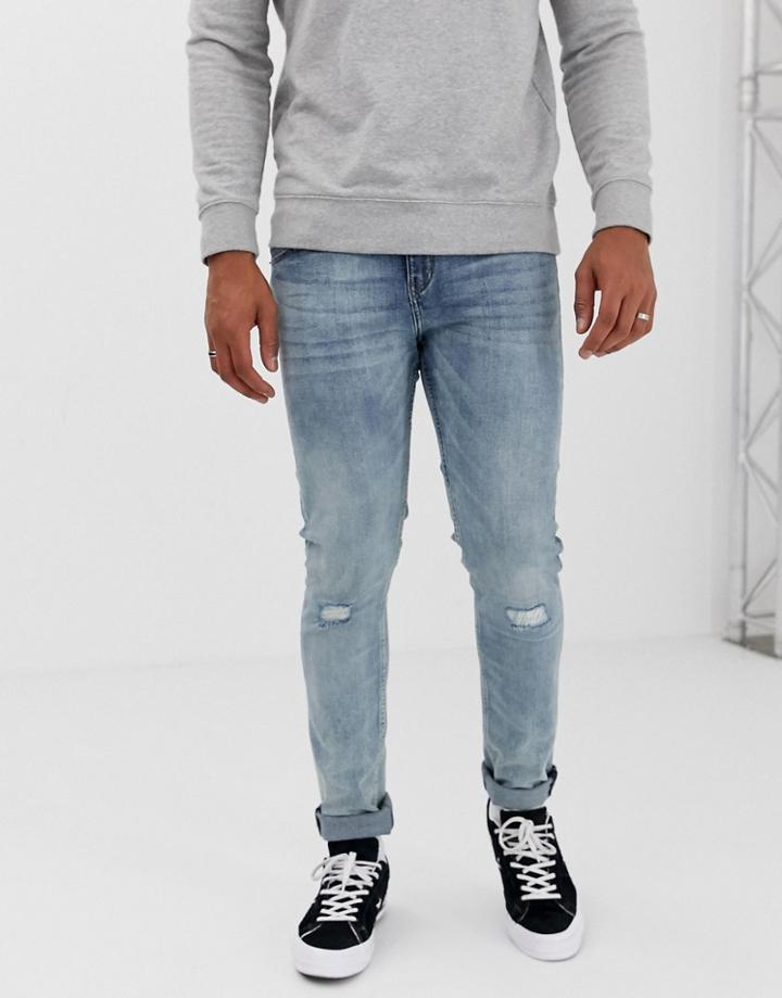 Cheap Monday Tight Skinny Jeans With Ripped Knees-blue