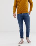 Wrangler Larston Slim Tapered Fit Jeans In Lone Ranger Light Wash - Blue