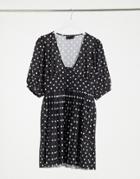Asos Design Mini Short Sleeve Pleated Dress With Button Detail In Black And White Polkadots