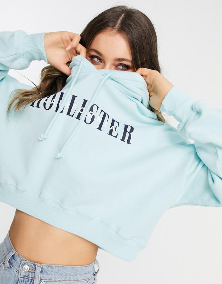 Hollister Cropped Logo Hoodie In Blue-blues