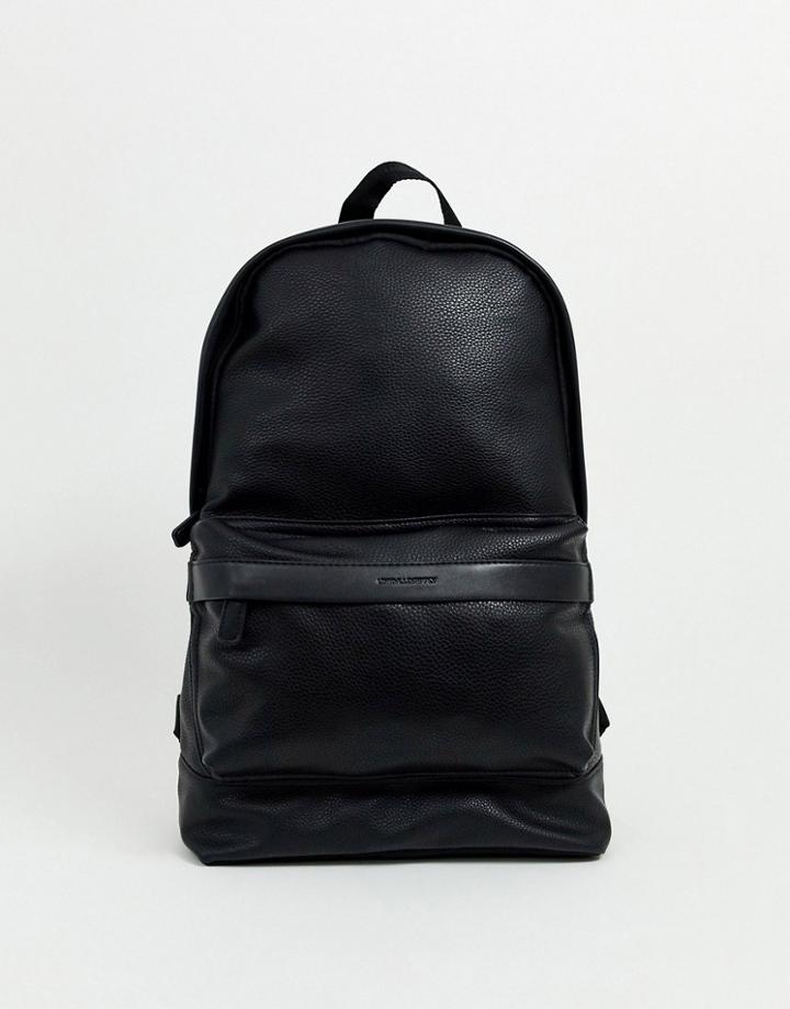 Asos Design Faux Leather Backpack In Black Pebble Grain With Logo Emboss