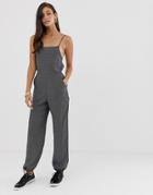 Asos Design Jumpsuit With Strappy Back And Elasticated Cuffs In Polka Dot-multi