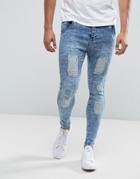 Illusive London Super Skinny Jeans In Acid Wash Blue With Distressing - Blue