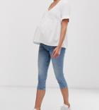 Asos Design Maternity Lisbon Mid Rise Cropped Skinny Jeans In Mid Stone Wash With Under The Bump Waistband-blue