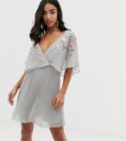 Asos Design Petite Flutter Sleeve Mini Dress With Pleat Skirt In Embroidery - Multi