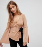 Boohoo Petite Flare Sleeve Ribbed Tie Side Top In Beige - Beige