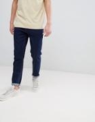 Asos Design Tapered Jeans In Indigo - Blue