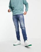 Asos Design Organic Cotton Blend Skinny Jeans In Mid Wash Blue-blues