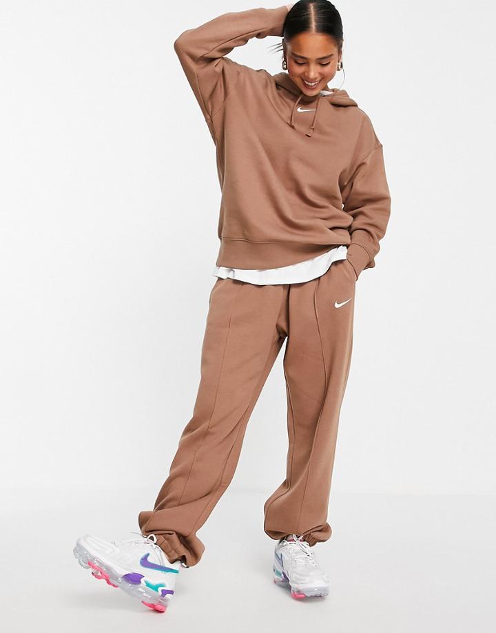 Nike Oversized Fleece Sweatpants In Earth Brown