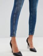 Asos Lisbon Skinny Mid Rise Jeans In Mid Wash Blue With Twisted Seams - Blue