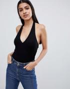 Asos Design Wrap Top In Rib With Halter Neck In Black - Black