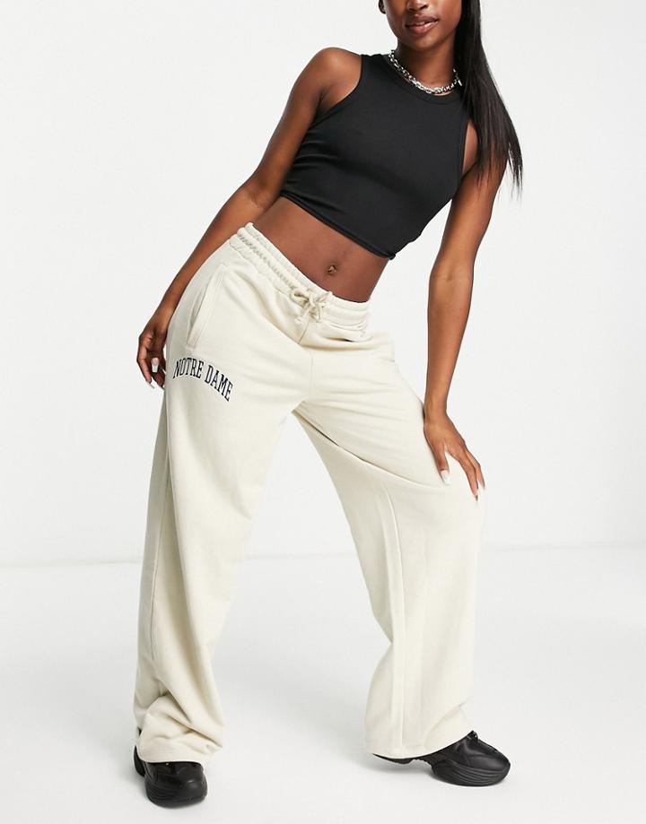 Topshop Straight Leg Sweatpants With Notre Dame Graphic In Beige-neutral