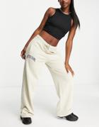 Topshop Straight Leg Sweatpants With Notre Dame Graphic In Beige-neutral