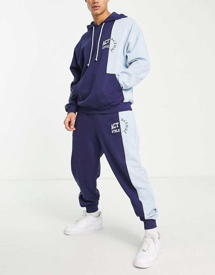 Asos Actual Sweatpants With Cut And Sew Detail With Logo Print In Blue - Part Of A Set-navy
