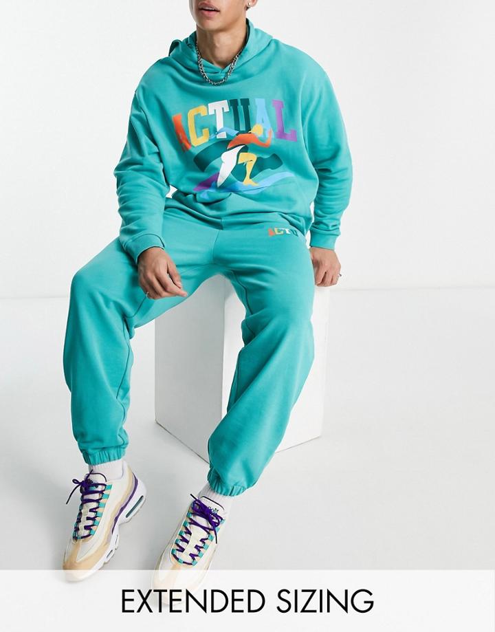 Asos Actual Relaxed Sweatpants With Multi Color Logo Print In Teal - Part Of A Set-green