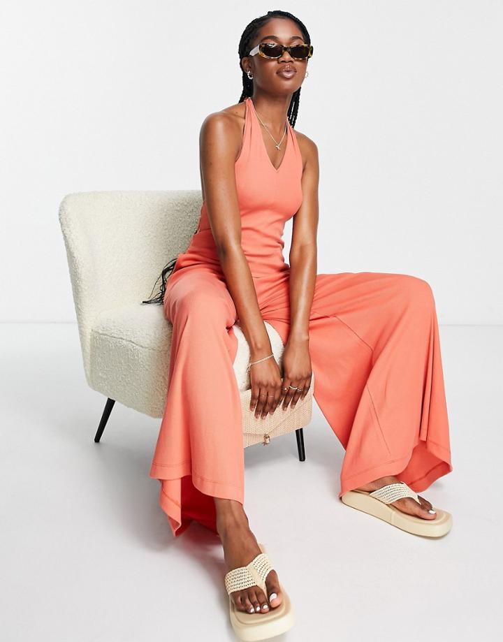 Asos Design Rib Halter Neck Jumpsuit With Wide Leg In Rust-red